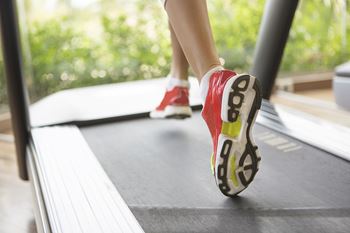 A person is running on a treadmill.